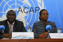 M. Musa Gassama, chef de la division des droits de l'homme de la minusca à gauche