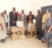 Le Représentant de l’Archevêque de Bangui réceptionne un  don de médicaments des mains du Conseiller de l'Ambassade de l’Ordre Souverain de Malte